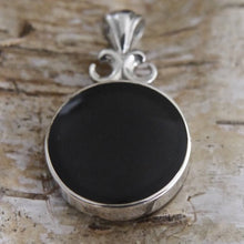 Load image into Gallery viewer, Jet pendant with blue john on the reverse side.