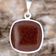 Load image into Gallery viewer, Goldstone and Jet Reversible Pendant