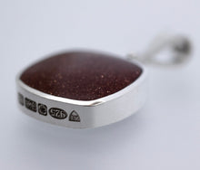 Load image into Gallery viewer, Goldstone & Jet Double Sided Pendant