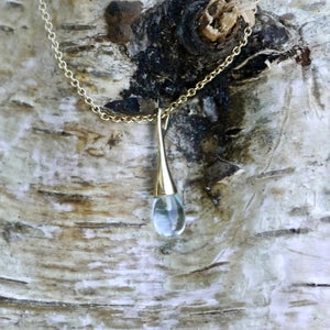 blue topaz raindrop pendant in 9 carat gold designed by Andrew Thomson