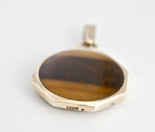 Load image into Gallery viewer, 9 carat gold tiger&#39;s eye reversible pendant with whitby jet designed by Andrew Thomson