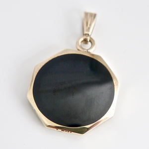 9 carat gold whitby jet reversible pendant with tigers eye designed by Andrew Thomson