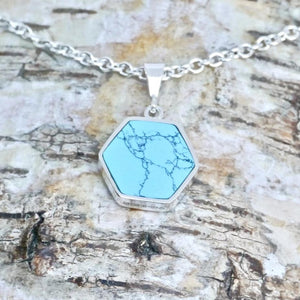 silver turquoise pendant handmade in the UK by designer Andrew Thomson