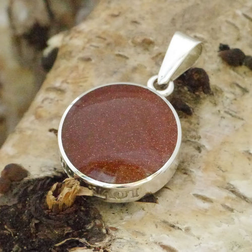 goldstone and sodalite reversible love you pendant