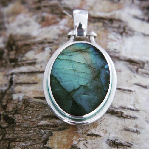 Labradorite Oval Pendant with Blue John on the reverse side.