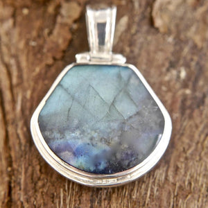 a labradorite reversible pendant with blue john on the other side